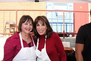 LOS ANGELES, NOV 30 - Cindy Williams, Kate Linder at the Hollywood Chamber Of Commerce 17th Annual Police And Fire BBQ at Wilcox Station on November 30, 2011 in Los Angeles, CA photo