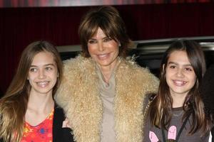 LOS ANGELES, NOV 12 - Lisa Rinna arrive at the Muppets World Premiere at El Capitan Theater on November 12, 2011 in Los Angeles, CA photo