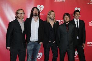 LOS ANGELES, FEB 10 - Foo Fighters arrives at the 2012 MusiCares Gala honoring Paul McCartney at LA Convention Center on February 10, 2012 in Los Angeles, CA photo