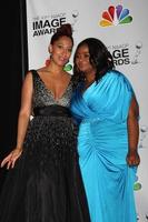 LOS ANGELES, FEB 17 - Tracee Ellis Ross, Octavia Spencer in the Press Room of the 43rd NAACP Image Awards at the Shrine Auditorium on February 17, 2012 in Los Angeles, CA photo