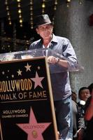 LOS ANGELES, JUL 9 - Charlie Sheen at the Hollywood Walk of Fame Ceremony for Slash at Hard Rock Cafe at Hollywood and Highland on July 9, 2012 in Los Angeles, CA photo