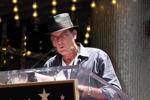 LOS ANGELES, JUL 9 - Charlie Sheen at the Hollywood Walk of Fame Ceremony for Slash at Hard Rock Cafe at Hollywood and Highland on July 9, 2012 in Los Angeles, CA photo