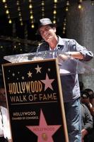 LOS ANGELES, JUL 9 - Charlie Sheen at the Hollywood Walk of Fame Ceremony for Slash at Hard Rock Cafe at Hollywood and Highland on July 9, 2012 in Los Angeles, CA photo