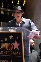 LOS ANGELES, JUL 9 - Charlie Sheen at the Hollywood Walk of Fame Ceremony for Slash at Hard Rock Cafe at Hollywood and Highland on July 9, 2012 in Los Angeles, CA photo