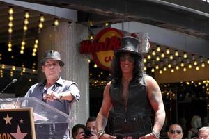 LOS ANGELES, JUL 9 - Charlie Sheen, Slash at the Hollywood Walk of Fame Ceremony for Slash at Hard Rock Cafe at Hollywood and Highland on July 9, 2012 in Los Angeles, CA photo