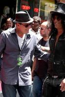 LOS ANGELES, JUL 9 - Charlie Sheen, Slash at the Hollywood Walk of Fame Ceremony for Slash at Hard Rock Cafe at Hollywood and Highland on July 9, 2012 in Los Angeles, CA photo