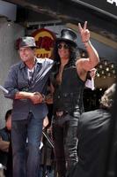 LOS ANGELES, JUL 9 - Charlie Sheen, Slash at the Hollywood Walk of Fame Ceremony for Slash at Hard Rock Cafe at Hollywood and Highland on July 9, 2012 in Los Angeles, CA photo