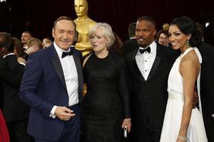 LOS ANGELES, MAR 2 - Kevin Spacey, Glenn Close, Jamie Foxx, Corinne Bishop at the 86th Academy Awards at Dolby Theater, Hollywood and Highland on March 2, 2014 in Los Angeles, CA photo