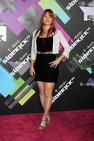 LOS ANGELES, APR 20 - Alicia Witt arriving at the Launch Of The New T-Mobile Sidekick 4G at Old Robinson May Building on April 20, 2011 in Beverly Hills, CA photo