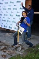 LOS ANGELES, FEB 9 - Theresa Castillo smashes concrete from a removed fence post at the 4th General Hospital Habitat for Humanity Fan Build Day at the 191 E Marker Street on February 9, 2013 in Long Beach, CA photo