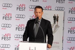 LOS ANGELES, NOV 7 - Tom Hanks at the Emma Thompson Hand and Footprint Ceremony at TCL Chinese Theater on November 7, 2013 in Los Angeles, CA photo