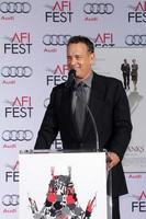 LOS ANGELES, NOV 7 - Tom Hanks at the Emma Thompson Hand and Footprint Ceremony at TCL Chinese Theater on November 7, 2013 in Los Angeles, CA photo