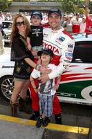 LOS ANGELES, APR 16 - Rachel Marcus Goddard, Daniel Goddard, Sons Sebastian and Ford at the Toyota Grand Prix Pro Celeb Race at Toyota Grand Prix Track on April 16, 2011 in Long Beach, CA photo