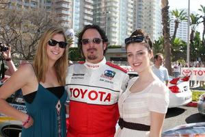 LOS ANGELES, APR 16 - Kim Coates and Daughters at the Toyota Grand Prix Pro Celeb Race at Toyota Grand Prix Track on April 16, 2011 in Long Beach, CA photo