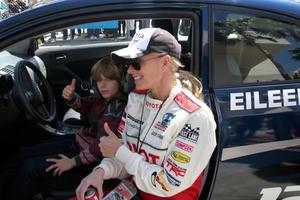 LOS ANGELES, APR 14 - Eileen Davidson, son at the 2012 Toyota Pro Celeb Race at Long Beach Grand Prix on April 14, 2012 in Long Beach, CA photo