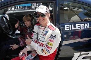 LOS ANGELES, APR 14 - Eileen Davidson, son at the 2012 Toyota Pro Celeb Race at Long Beach Grand Prix on April 14, 2012 in Long Beach, CA photo