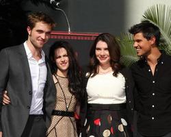 LOS ANGELES, NOV 3 - Robert Pattinson, Kristen Stewart, Stephanie Meyers, Taylor Lautner at the Handprint and Footprint Ceremony for the Twilight Saga Actors at Grauman s Chinese Theater on November 3, 2011 in Los Angeles, CA photo