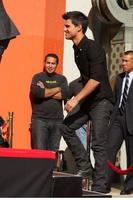 LOS ANGELES, NOV 3 - Taylor Lautner at the Handprint and Footprint Ceremony for the Twilight Saga Actors at Grauman s Chinese Theater on November 3, 2011 in Los Angeles, CA photo