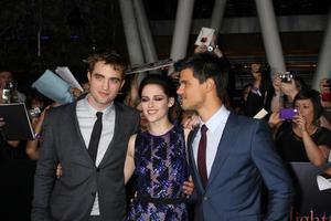 LOS ANGELES, NOV 14 - Robert Pattinson, Kristen Stewart, Taylor Lautner arrives at the Twilight - Breaking Dawn Part 1 World Premiere at Nokia Theater at LA LIve on November 14, 2011 in Los Angeles, CA photo