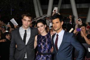 LOS ANGELES, NOV 14 - Robert Pattinson, Kristen Stewart, Taylor Lautner arrives at the Twilight - Breaking Dawn Part 1 World Premiere at Nokia Theater at LA LIve on November 14, 2011 in Los Angeles, CA photo