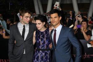 LOS ANGELES, NOV 14 - Robert Pattinson, Kristen Stewart, Taylor Lautner arrives at the Twilight - Breaking Dawn Part 1 World Premiere at Nokia Theater at LA LIve on November 14, 2011 in Los Angeles, CA photo