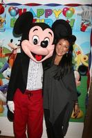 LOS ANGELES, DEC 4 - Mickey Mouse Character, Kelly Hu at the Amelie Bailey s 1st Birthday Party at Private Residence on December 4, 2016 in Studio CIty, CA photo