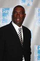 Antwone Fisher with guest arriving at the Gay and Lesbian Center An Evening With Women Gala at the Beverly Hilton Hotel in Beverly Hills, California on April 24, 2009 photo