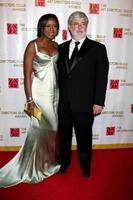 George Lucas and Mellody Hobson arriving at the Art Director s Guild Awards at the Beverly Hilton Hotel, in Beverly Hills, CA on 
February 14, 2009 photo