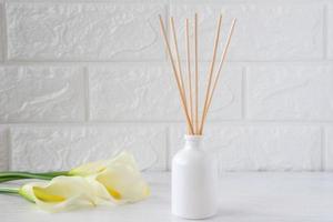 The aroma reed diffuser with the stick perfume are decorated in the room minimal design idea photo
