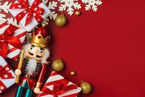 Christmas concept background. Top view of Christmas ornament and christmas wooden nutcracker toy solider with space for text photo