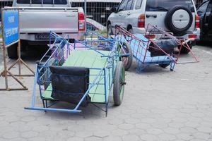 loading and unloading carts of passenger goods at the port of Bontang, East Kalimantan, Indonesia. november 09 2022 photo