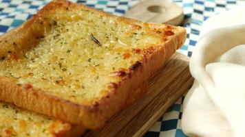 Sliced bread toast with butter spread, close up video