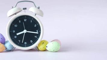 A clock with colorful easter eaggs video