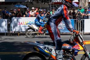 GUADALAJARA, MEXICO - OCTOBER 25 2022 Showrun Aaron Colton, Didier Goirand and ivan Ramirez riding motorcycles photo