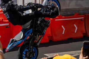 GUADALAJARA, MEXICO - OCTOBER 25 2022 Showrun Aaron Colton, Didier Goirand and ivan Ramirez riding motorcycles photo