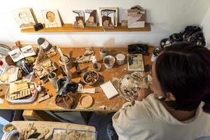 studio or work space of a hispanic woman artist, oil painting, mexico photo