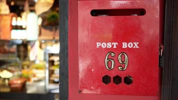 Red post box with numbers video