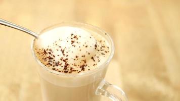 Chai with spices in a transparent cup video