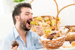 Young Men Eating Pastries photo