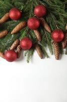 Holidays greeting card or banner composition with pine tree branches. Merry Christmas background and Happy New Year 2023. photo