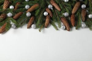 Holidays greeting card or banner composition with pine tree branches. Merry Christmas background and Happy New Year 2023. photo