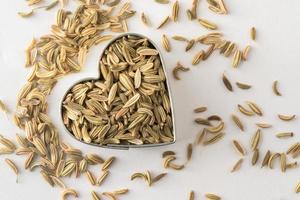 Fennel Seeds in a Heart Shape photo