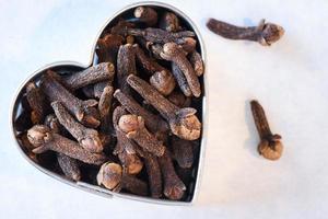 Whole Cloves Spice in a Heart Shape photo