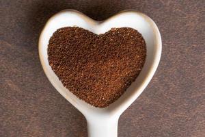 Ground Cloves Spice in a Heart Shape photo