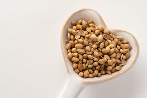 Whole Coriander Seeds in a Heart Shape photo