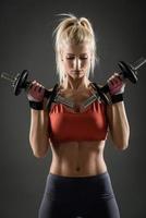 Fitness Woman With Dumbbells photo