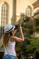 mujer fotógrafa vista foto