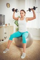 Exercising With Dumbbell At Home photo