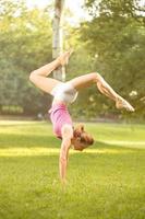 Handstand  Exercise On Grass photo
