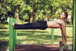 Young Man Exercising In Nature photo